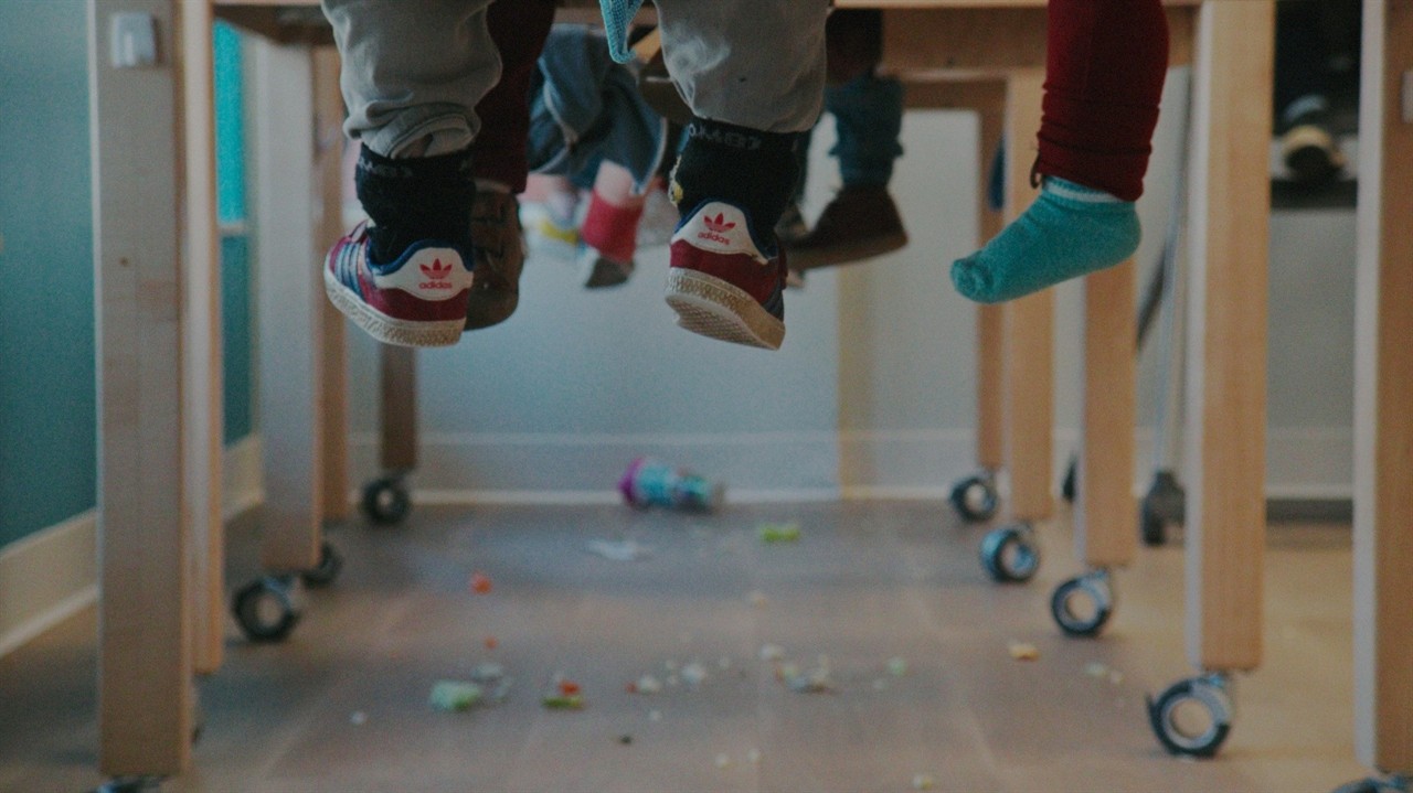 Small feet hanging above the floor